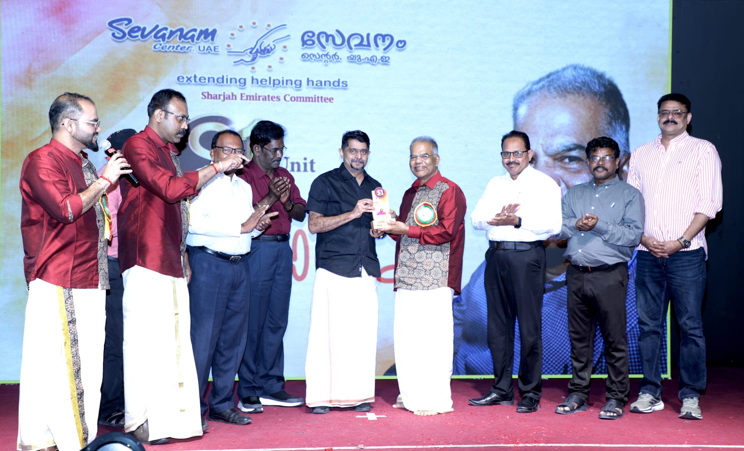 Receiving award on stage