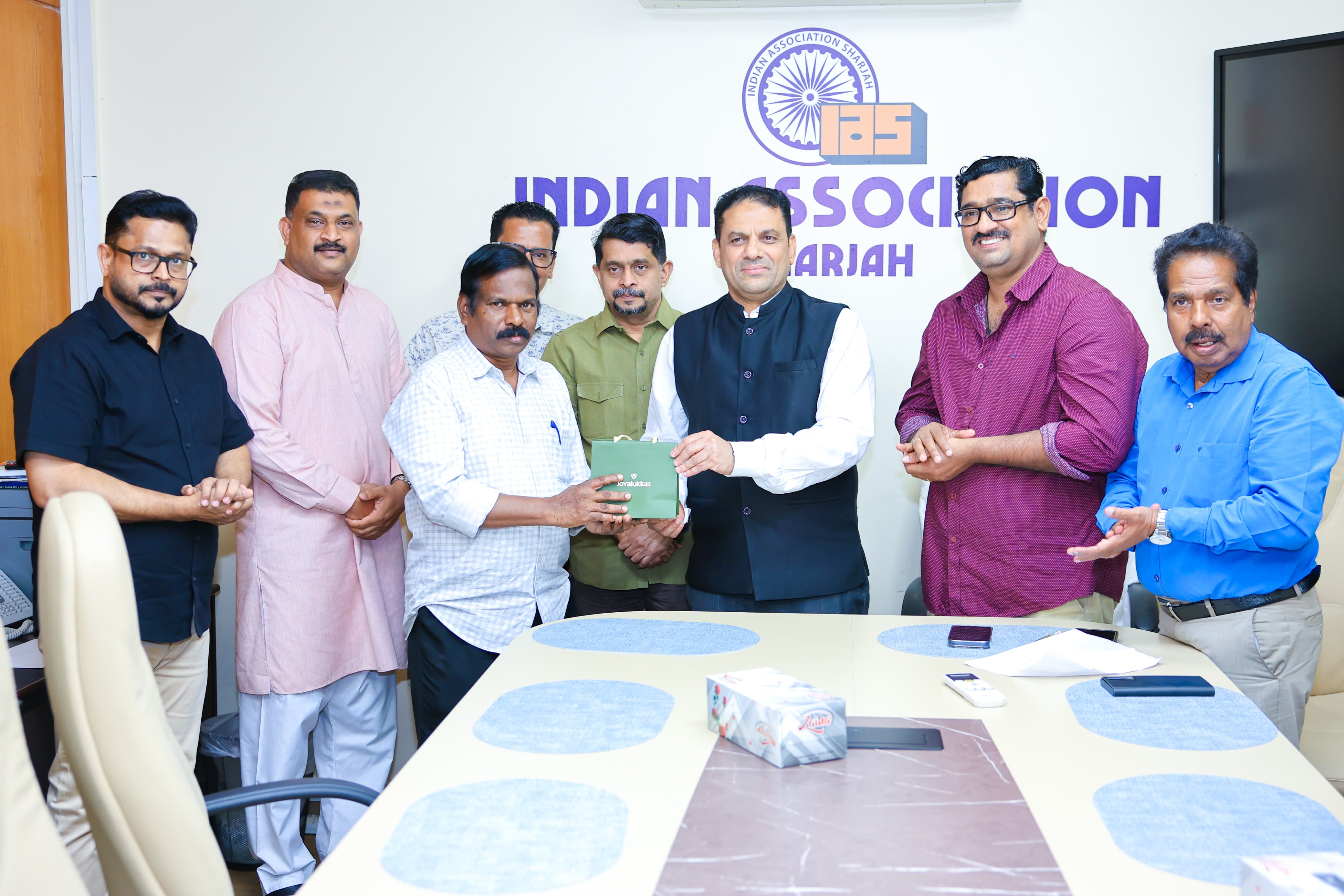 Gift presentation by community member at IAS